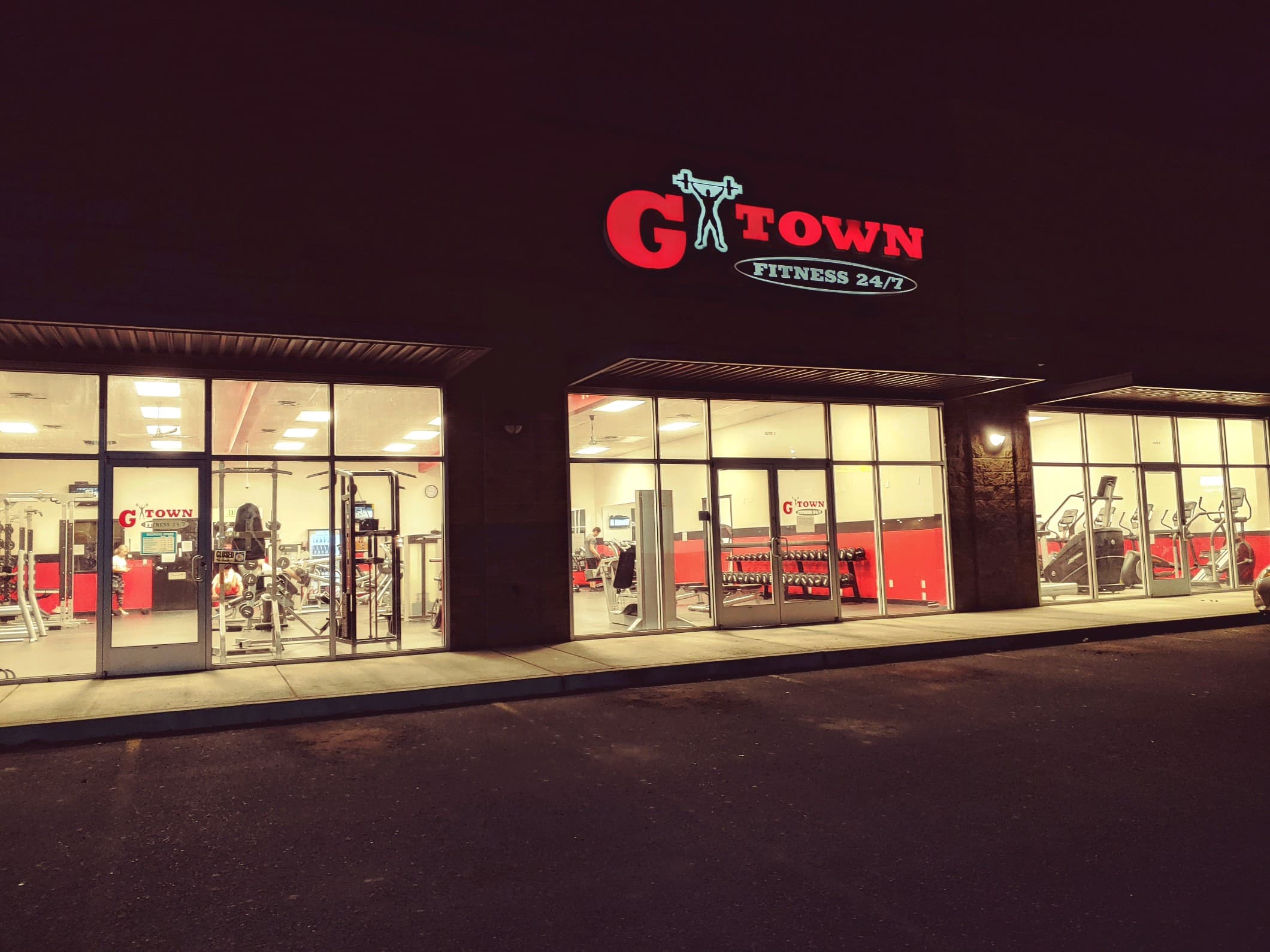 G-Town Fitness storefront at night